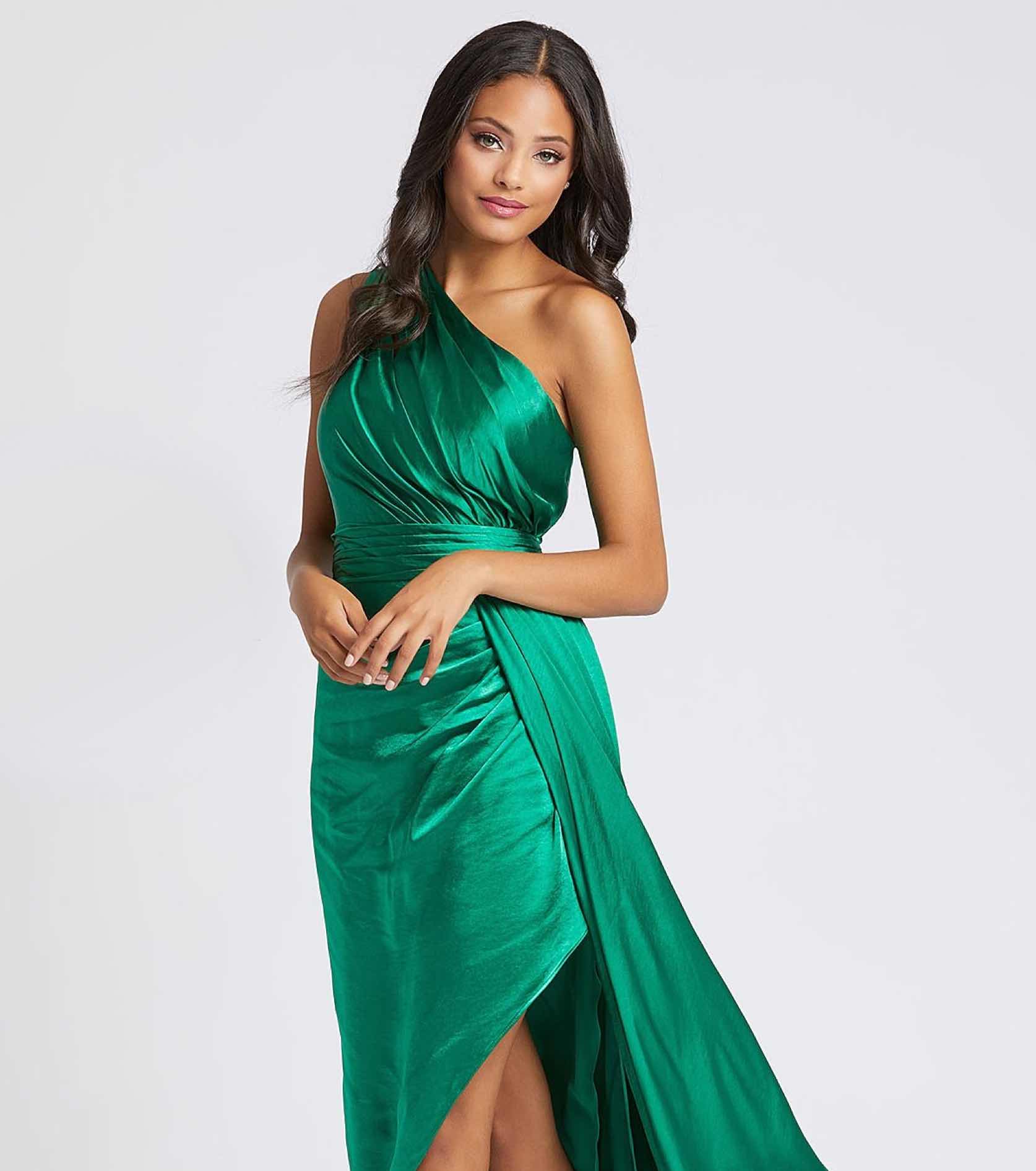 Model in green one shoulder Cassandra Stone gown