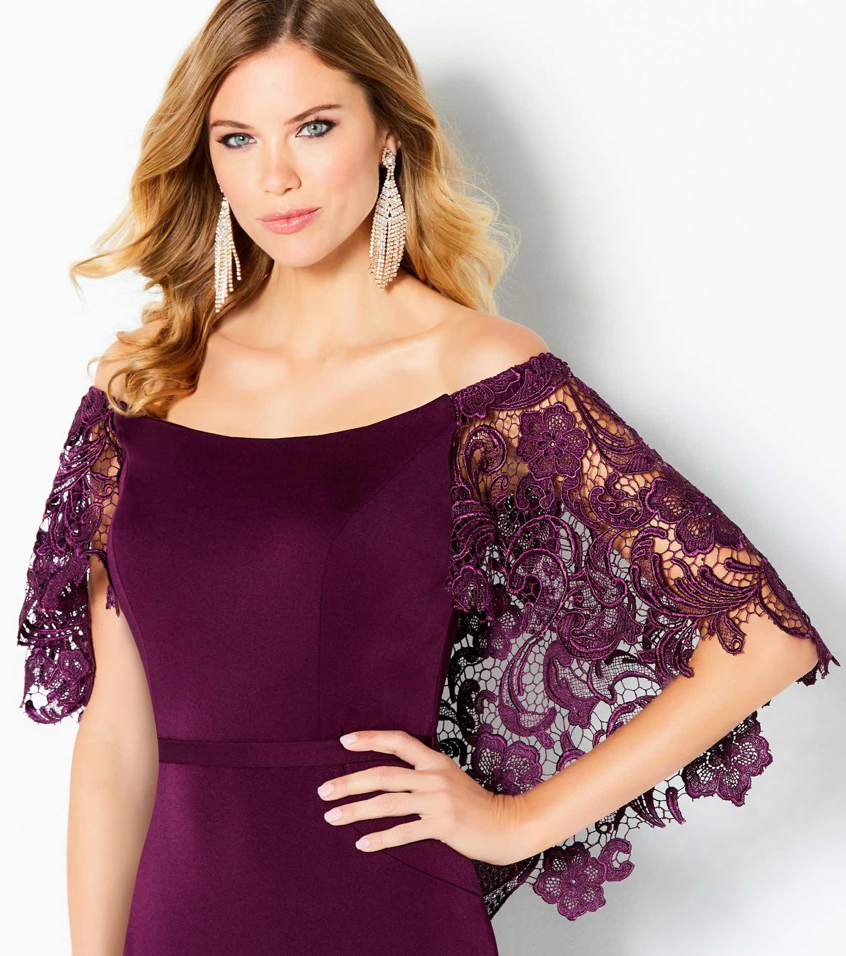 Model in plum Cameron Black dress with lace sleeves